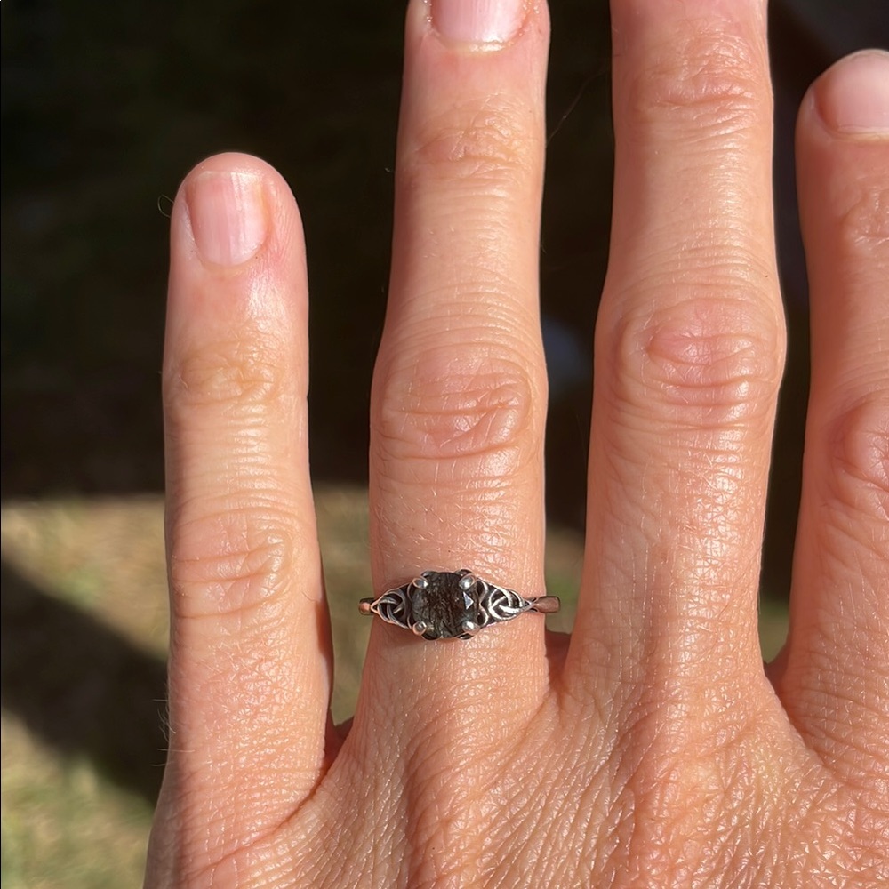 Size 7 Celtic-inspired sterling silver ring with faceted rutile quartz stone